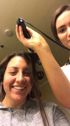 All good roommates curl each other's hair.